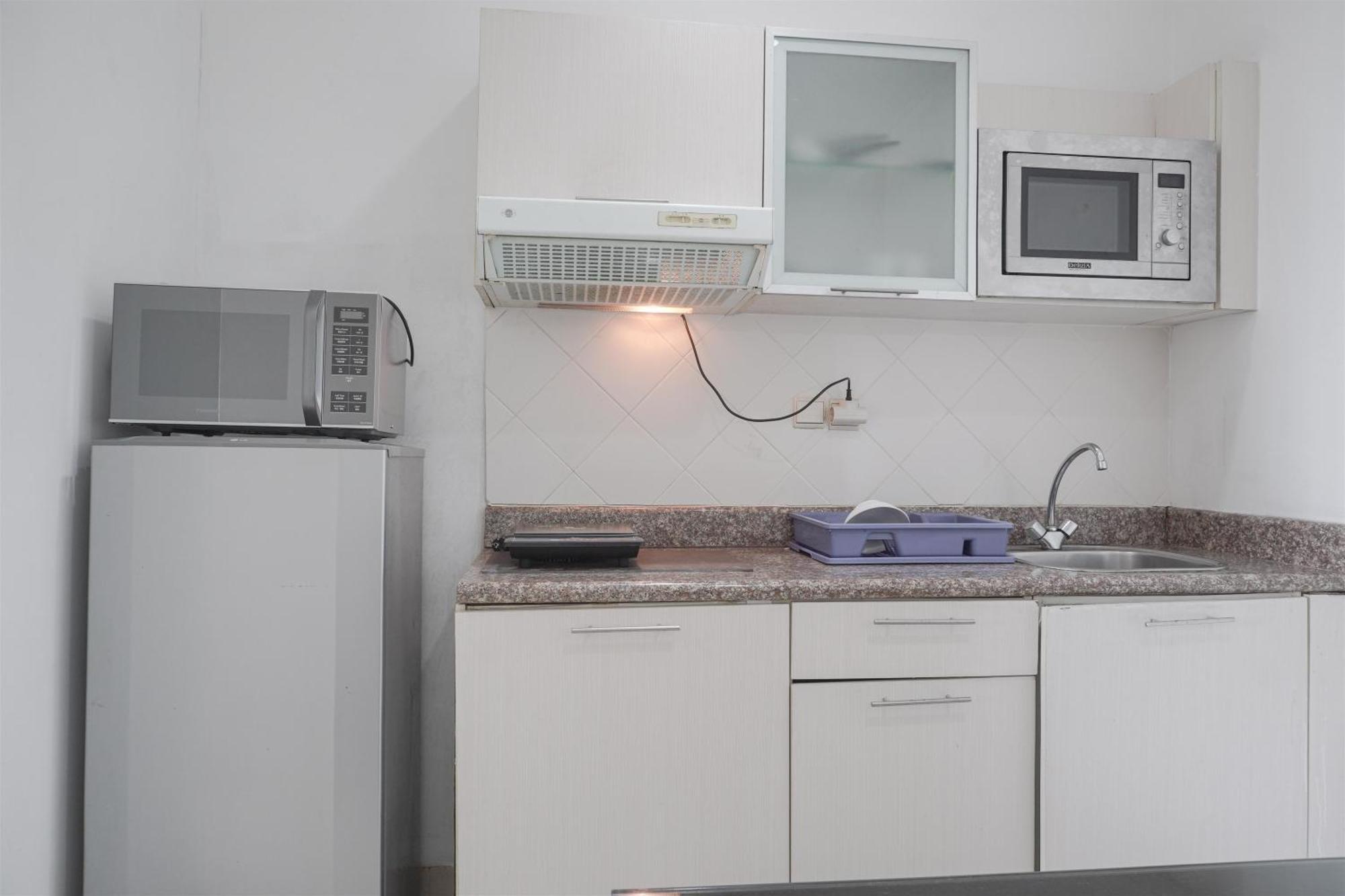 Appartement Cozy And Tidy 1br At The Bellezza By Travelio